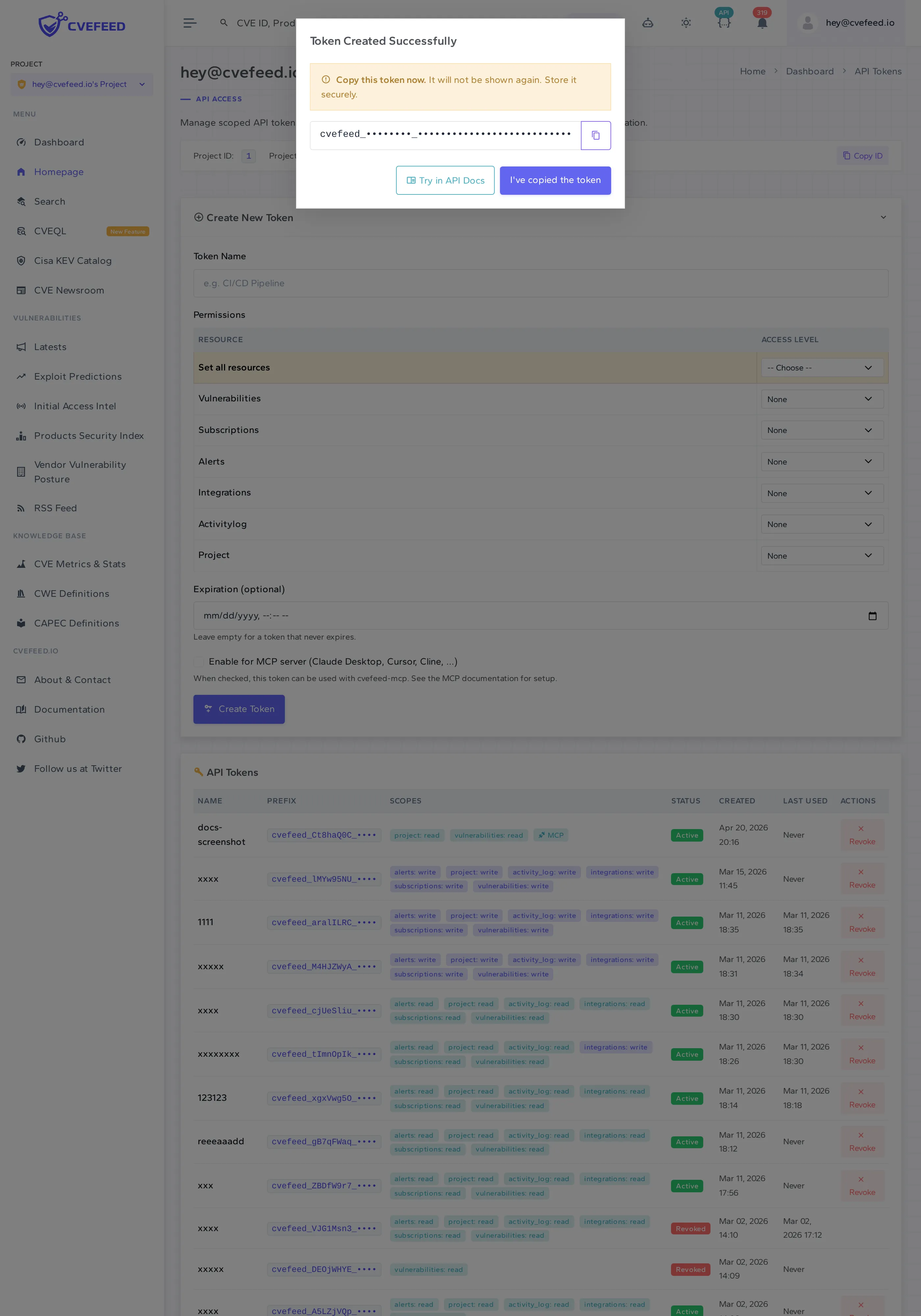 Token Created Successfully modal displaying the masked raw token value with Copy this token and I've copied the token buttons
